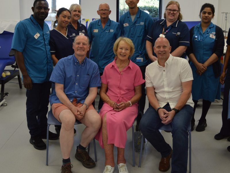 Carolyn with Martin Wilson, left, and Martin Darwin at the blood donor centre