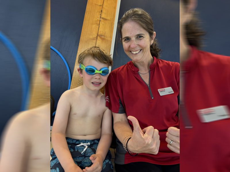 Five year old Ira Aldridge with his swimming teacher Hannah Barber