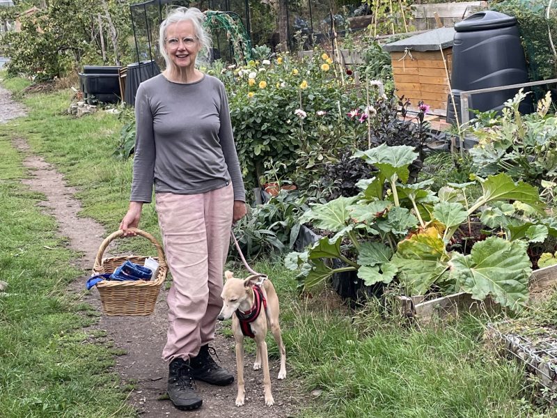 Jan Davies with her dog Roo on the path